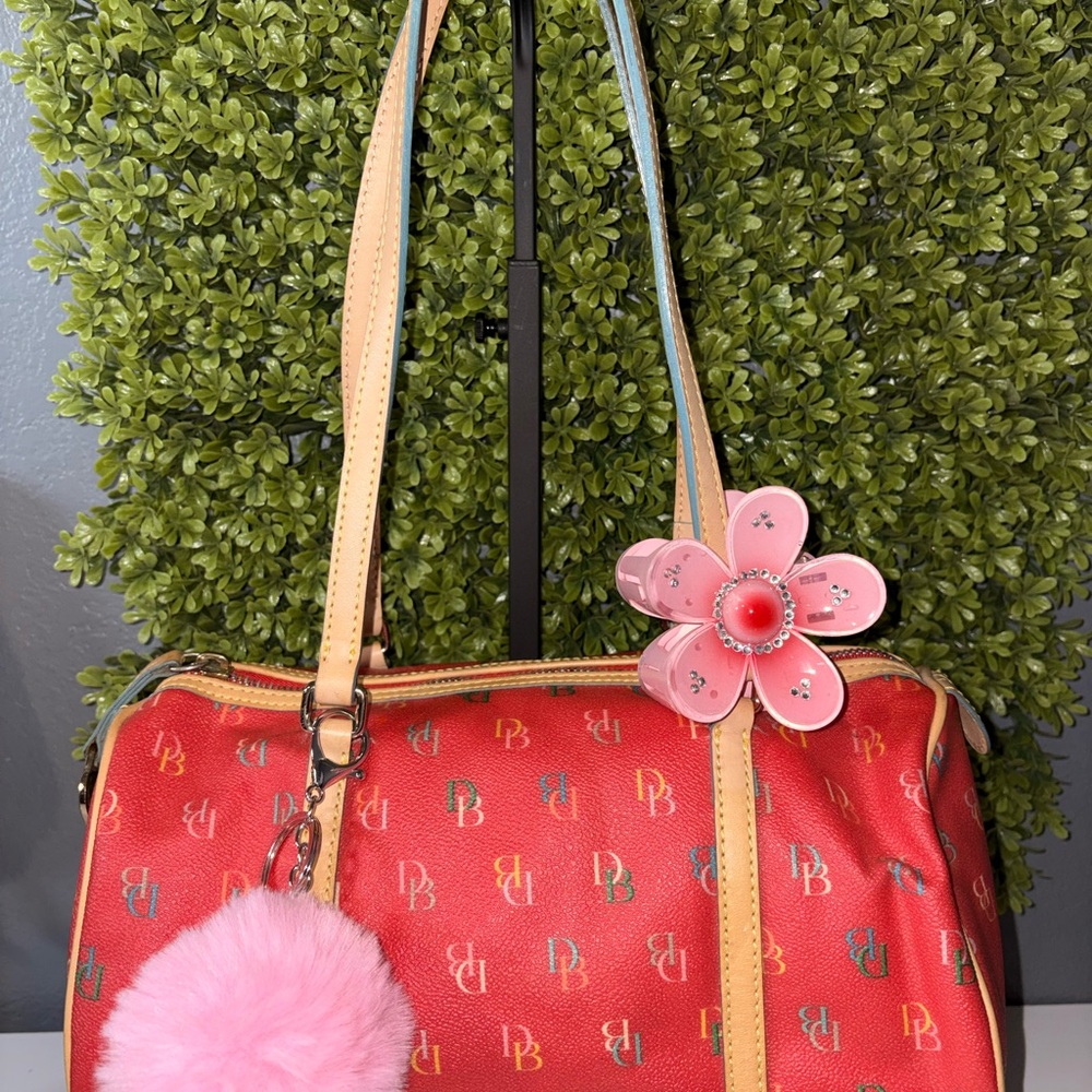 Dooney & Bourke Red and Tan Shoulder Bag with Pink Pom-Pom